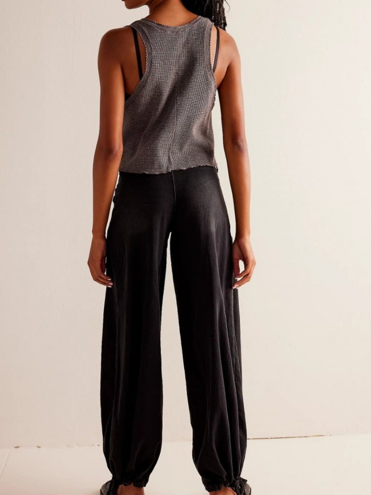 Jeans con orlo drappeggiato regolabile