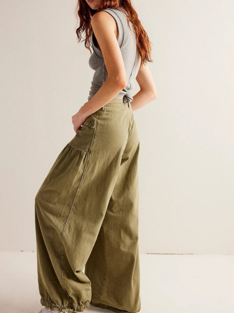 Jeans con orlo drappeggiato regolabile