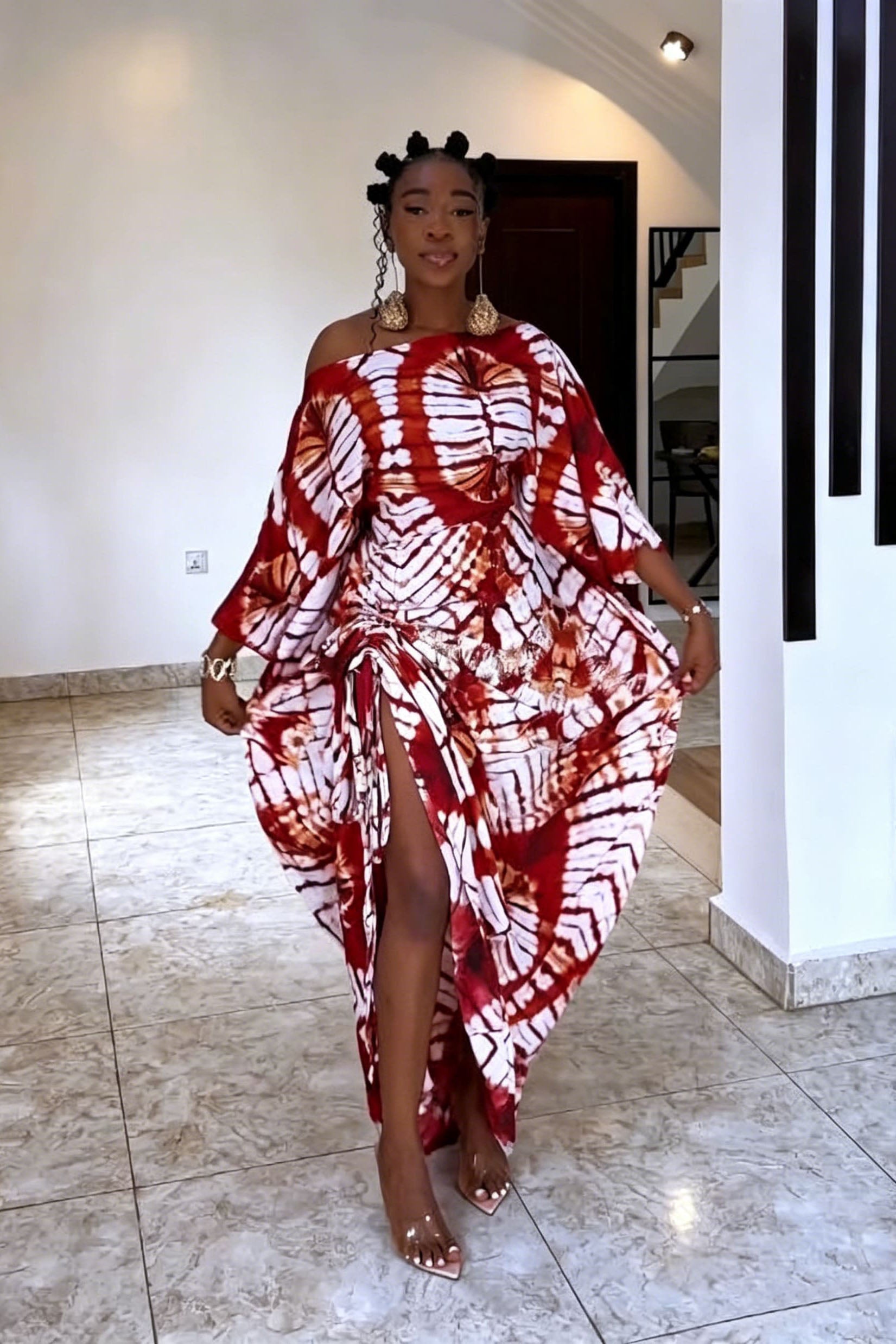 Robe longue épaules dénudées à motif radial