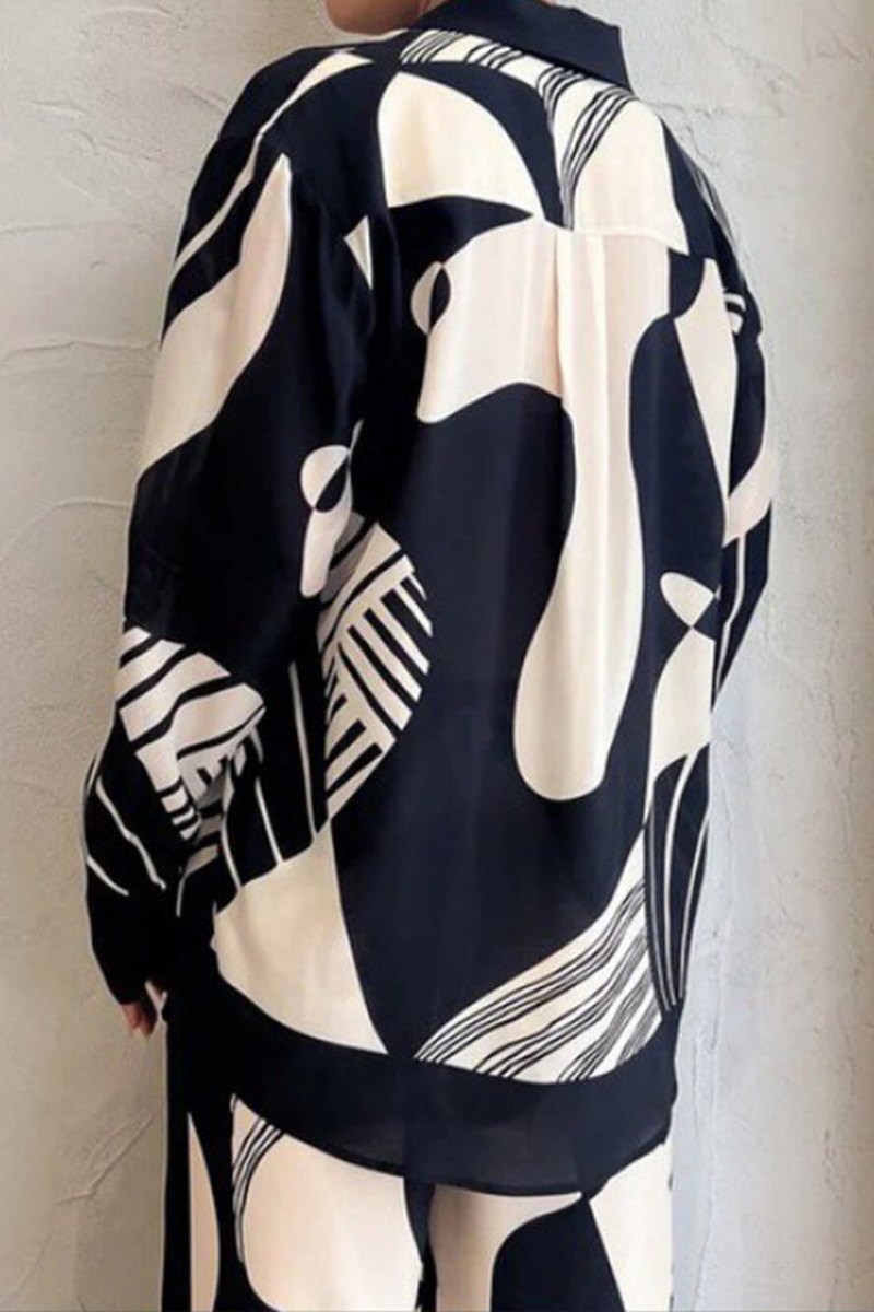 ट्रेंडी ग्रैफ़िटी प्रिंट लूज़ वाइड लेग पैंट सेट