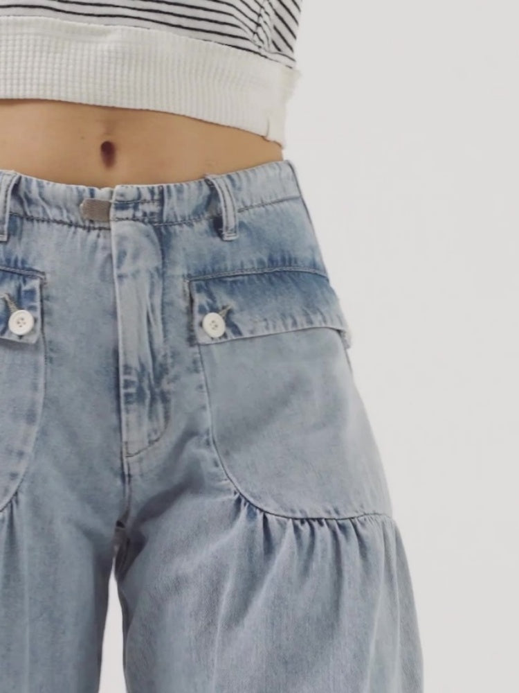 Jeans con orlo drappeggiato regolabile