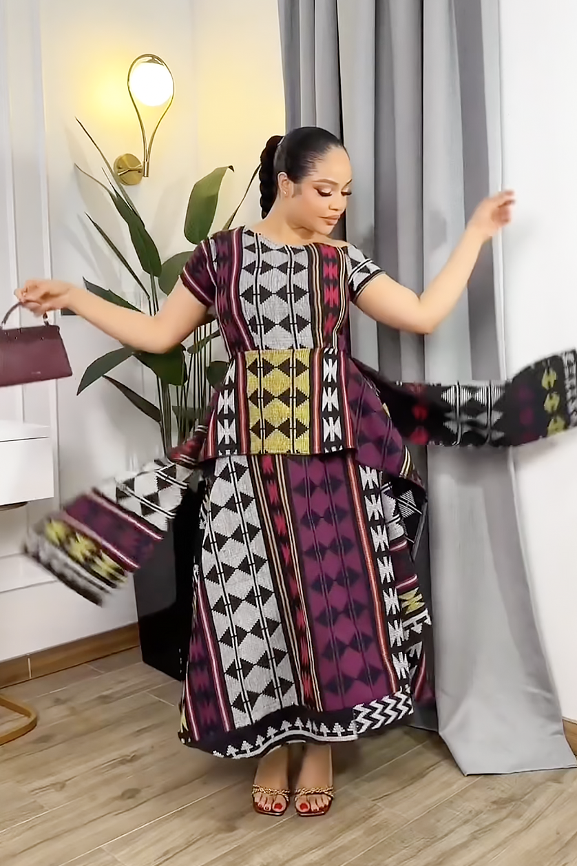 Živě barevné geometrické šaty s odhalenými rameny