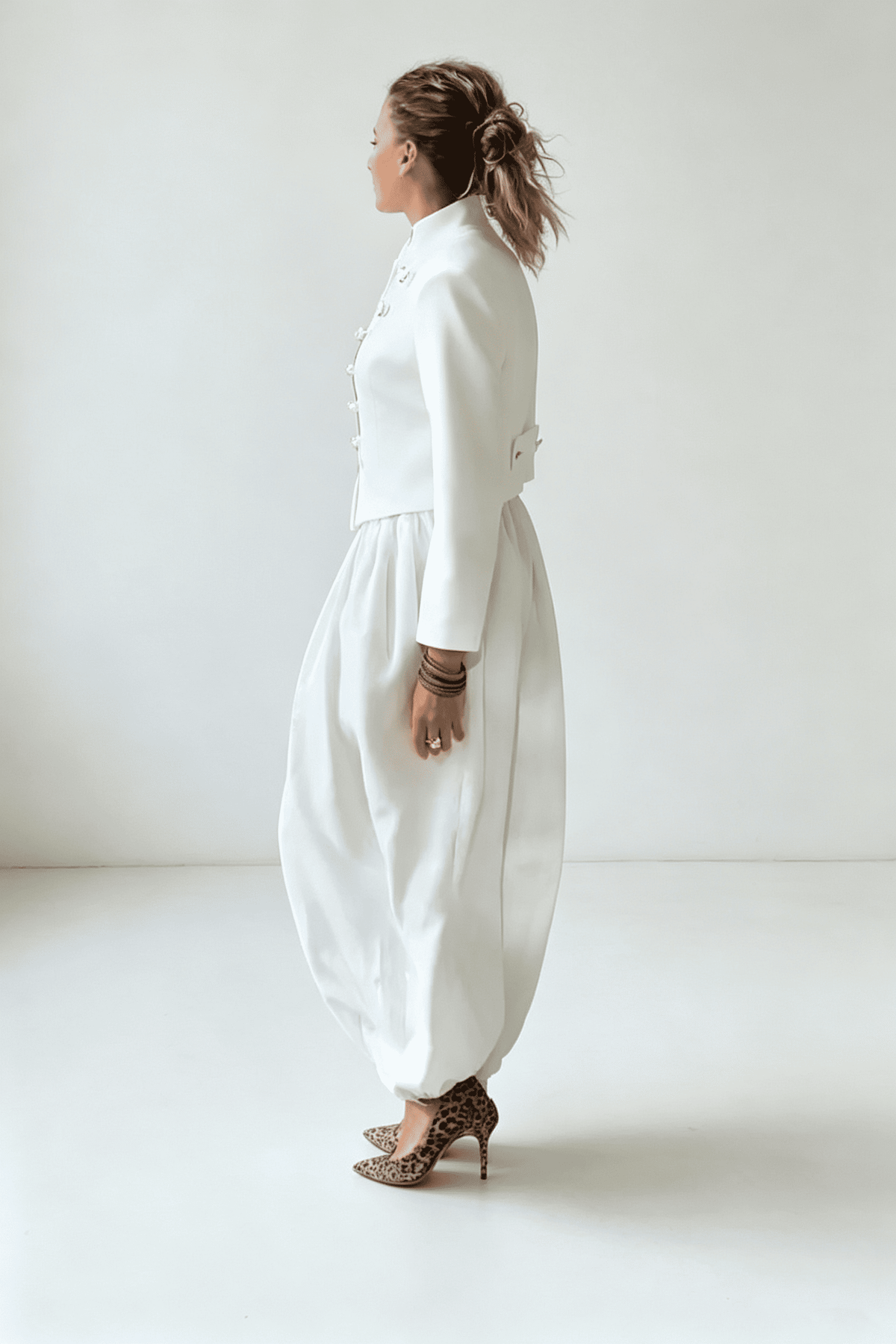 Top drappeggiato asimmetrico con frange