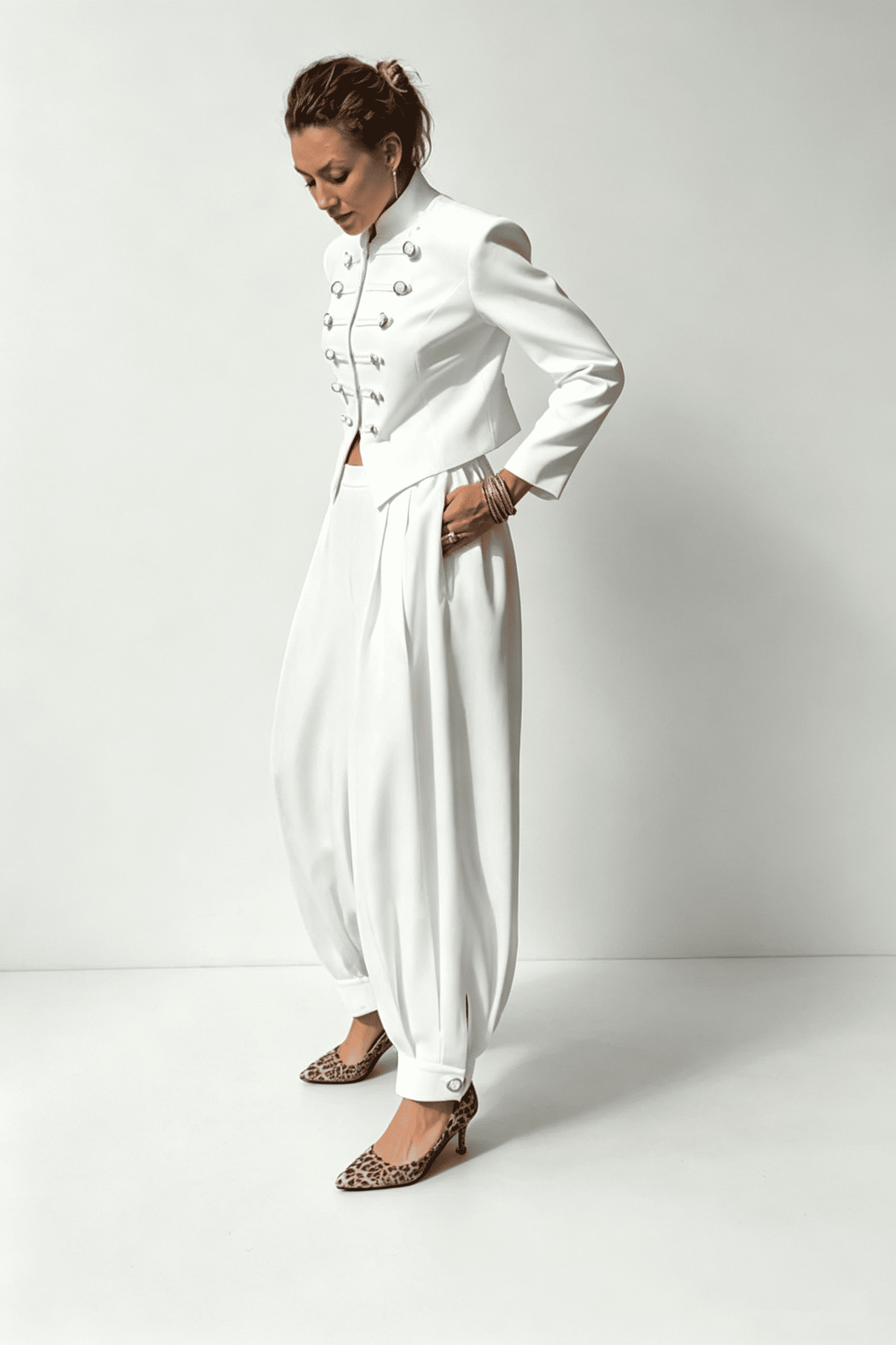 Top drappeggiato asimmetrico con frange