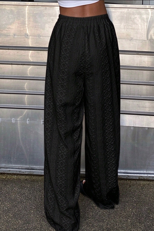 Pantaloni a gamba larga con volant diagonale