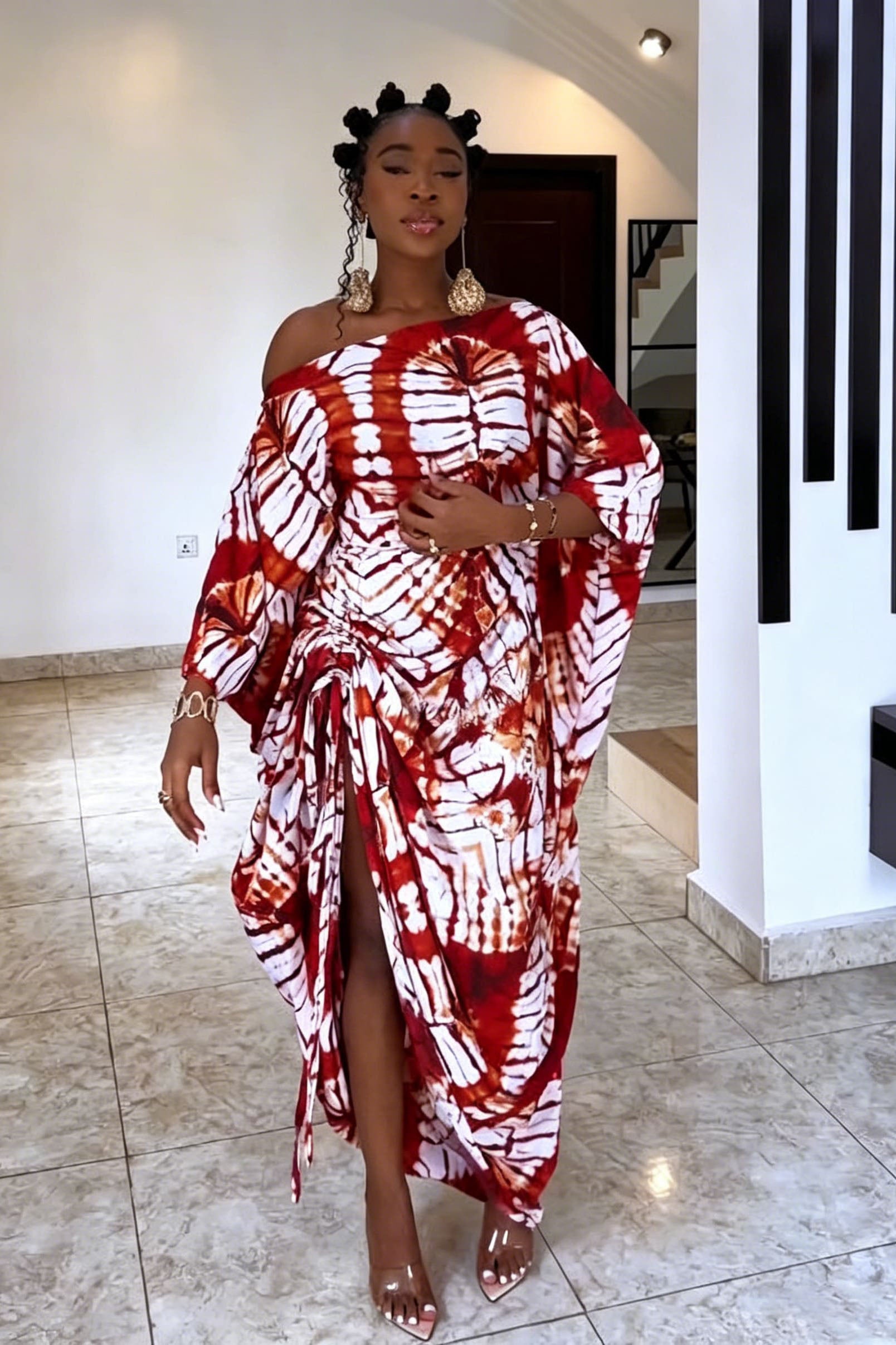 Robe longue épaules dénudées à motif radial