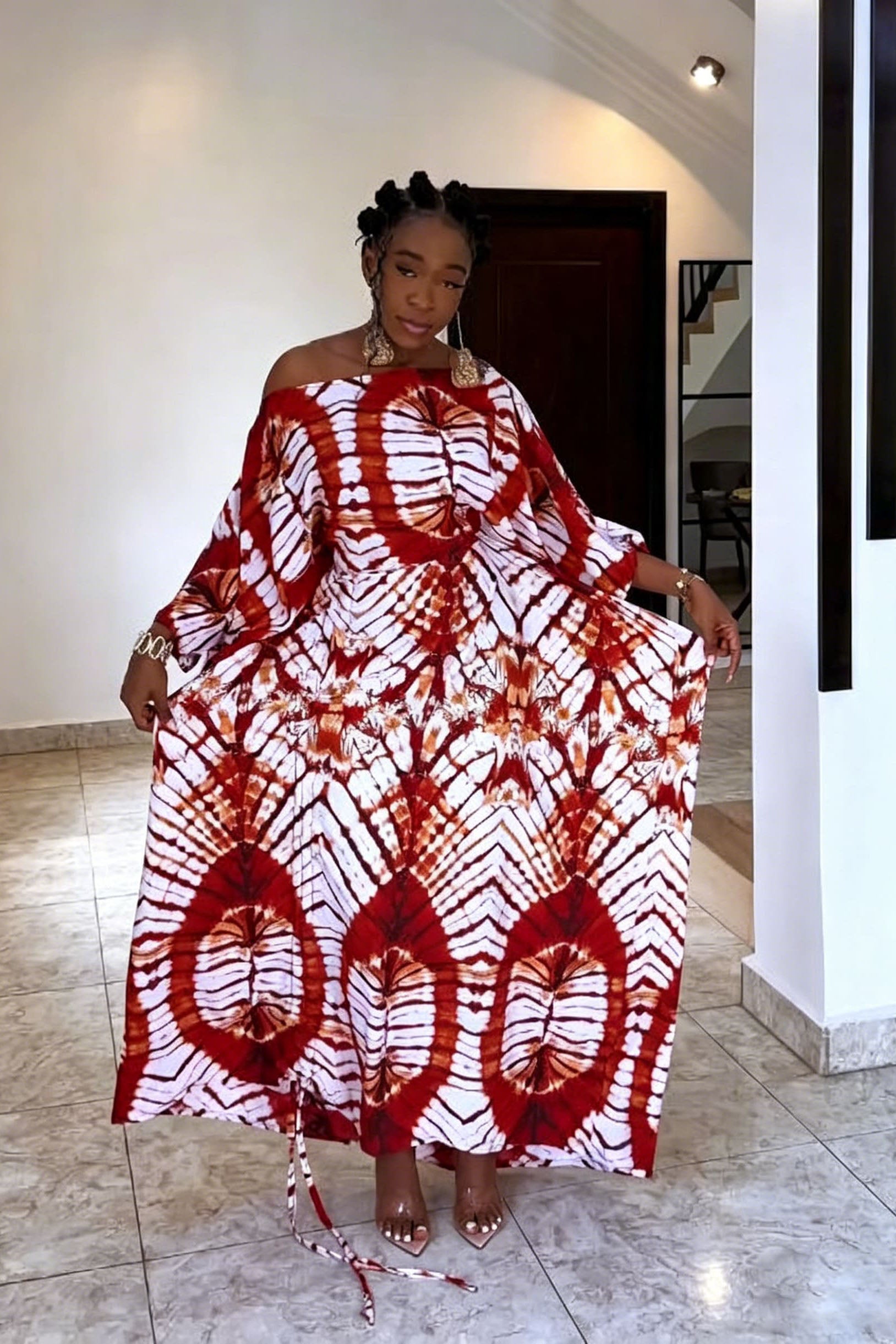 Robe longue épaules dénudées à motif radial