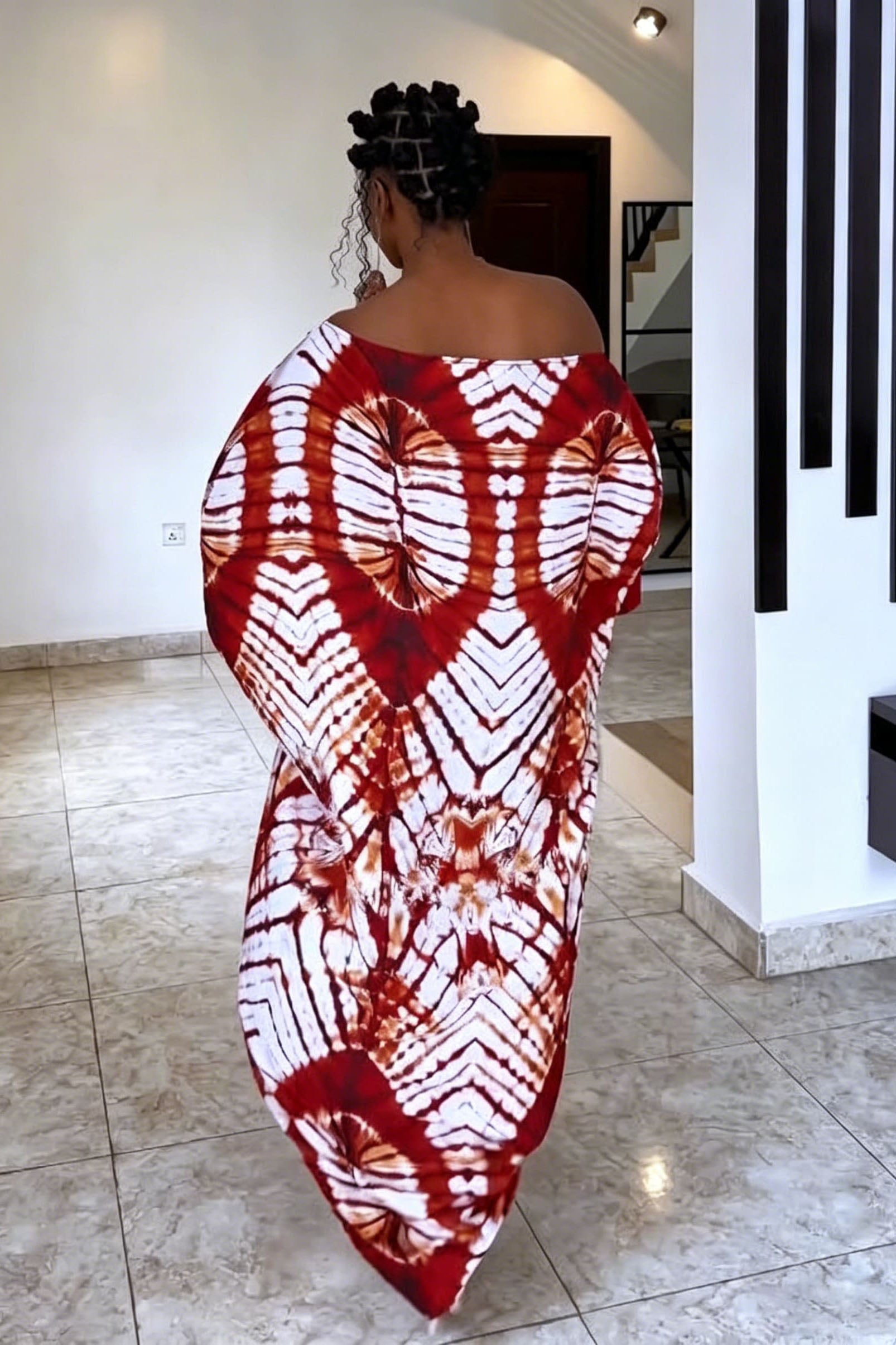 Robe longue épaules dénudées à motif radial