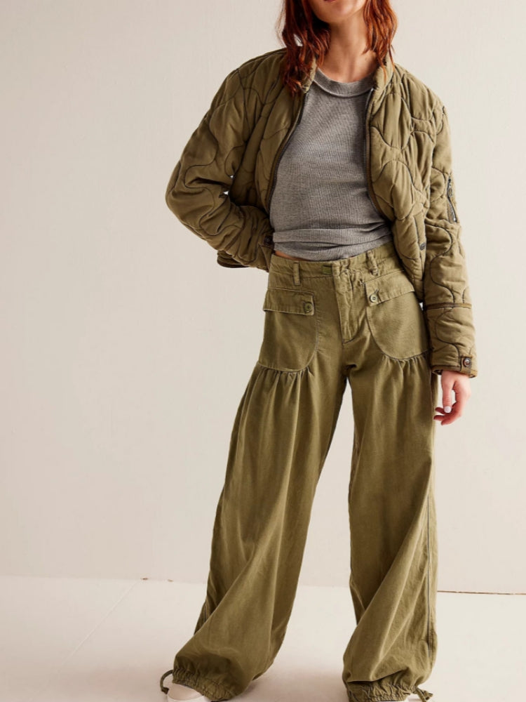 Jeans con orlo drappeggiato regolabile