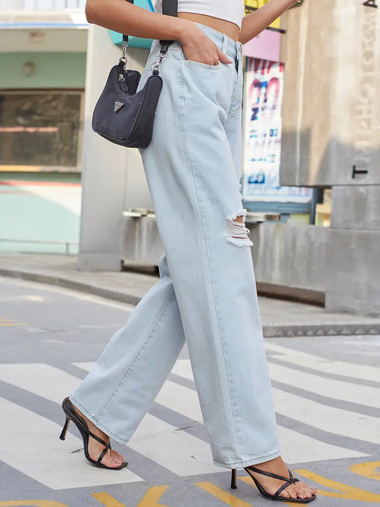 Pantaloni in denim vintage slavato effetto usurato