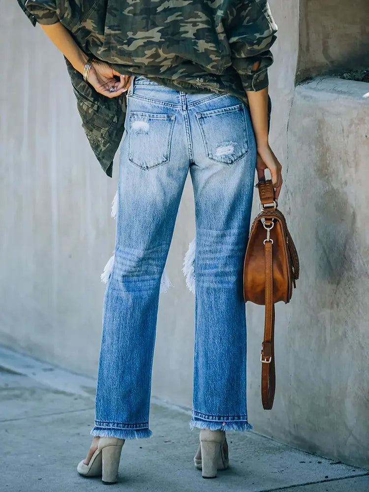 Ripped Distressed Jeans am Bettler-Stil