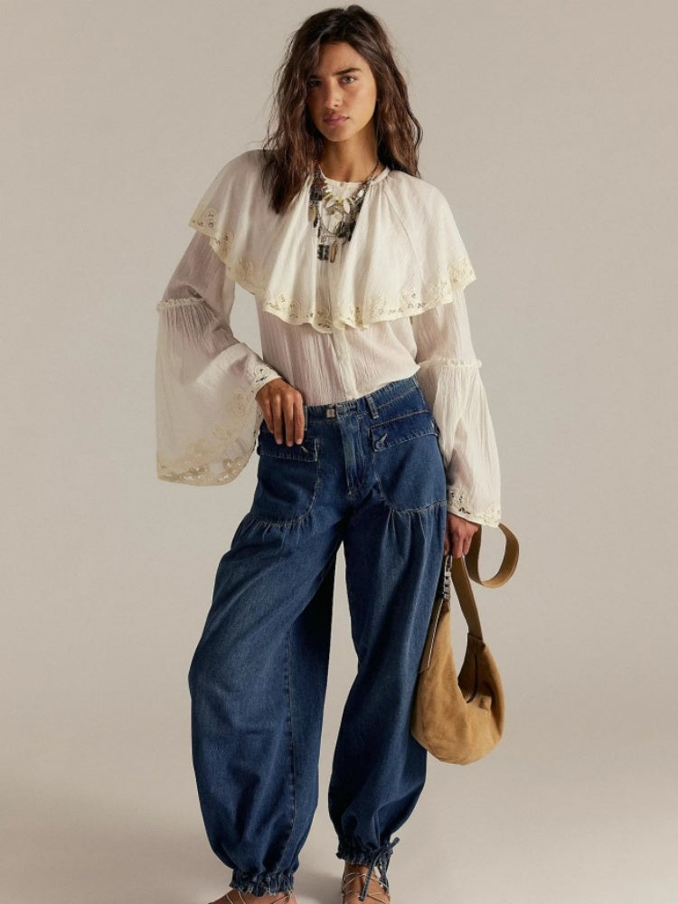 Jeans con orlo drappeggiato regolabile