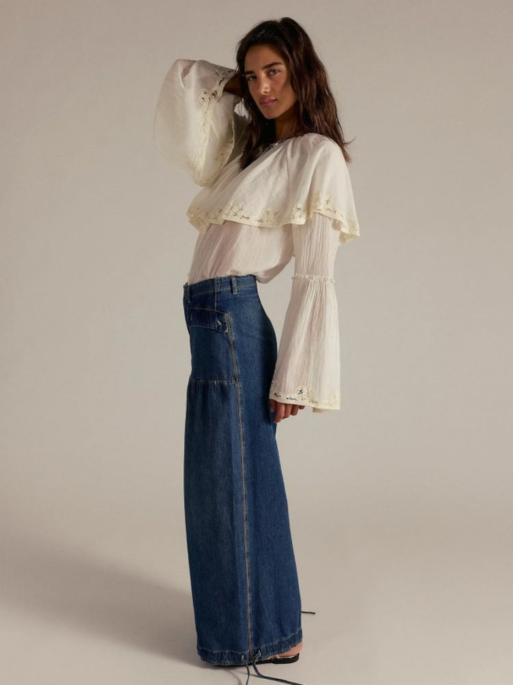 Jeans con orlo drappeggiato regolabile