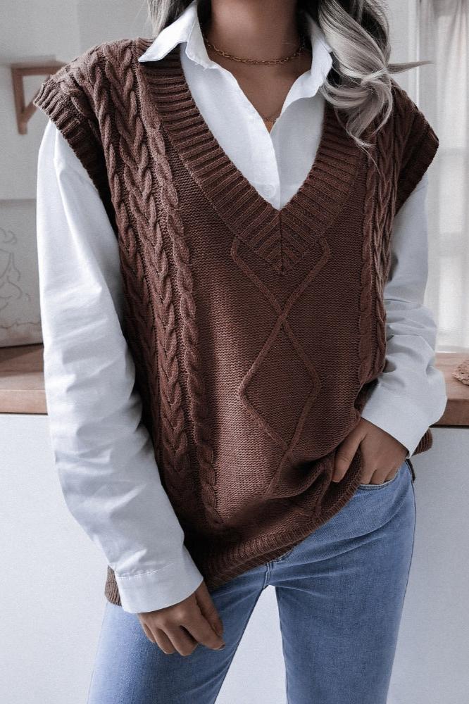 Ensfarvet geometrisk sweatervest