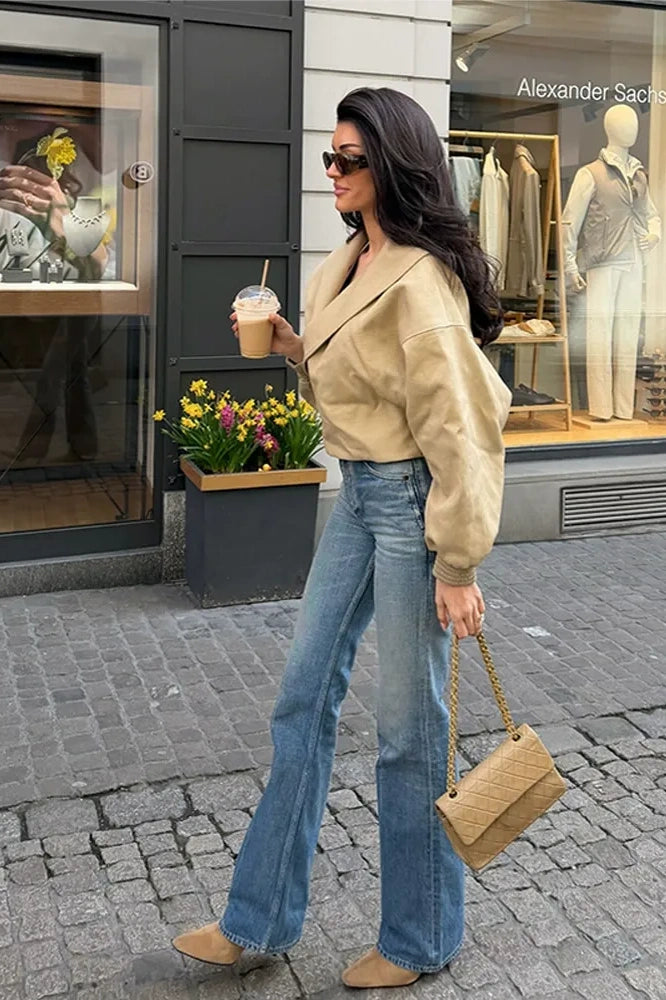 Gabardina asimétrica de hombros caídos