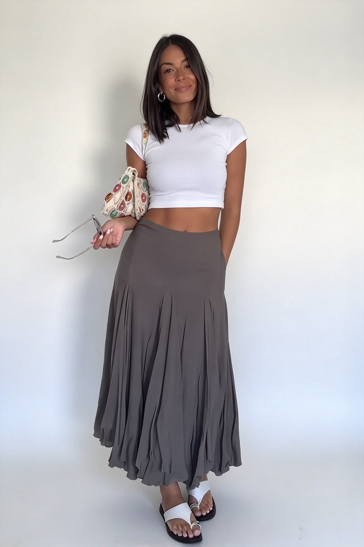 Asymmetrisk lagdelt midinederdel med geometrisk print