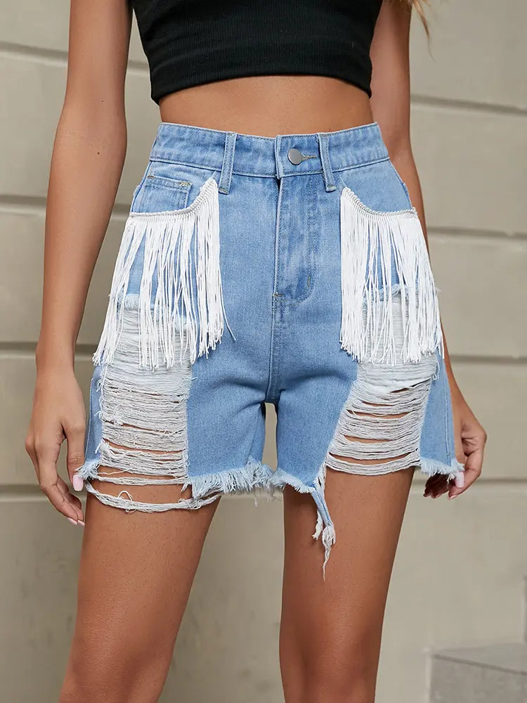 Shorts di jeans lavati con frange