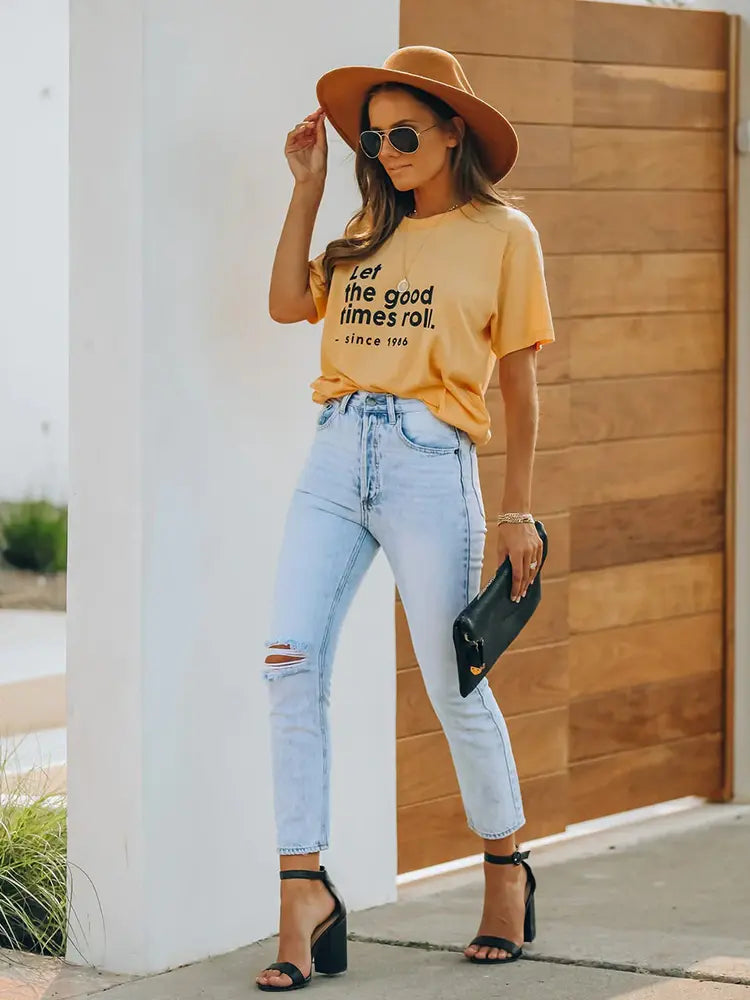 Pantaloni vintage in denim strappato alla caviglia