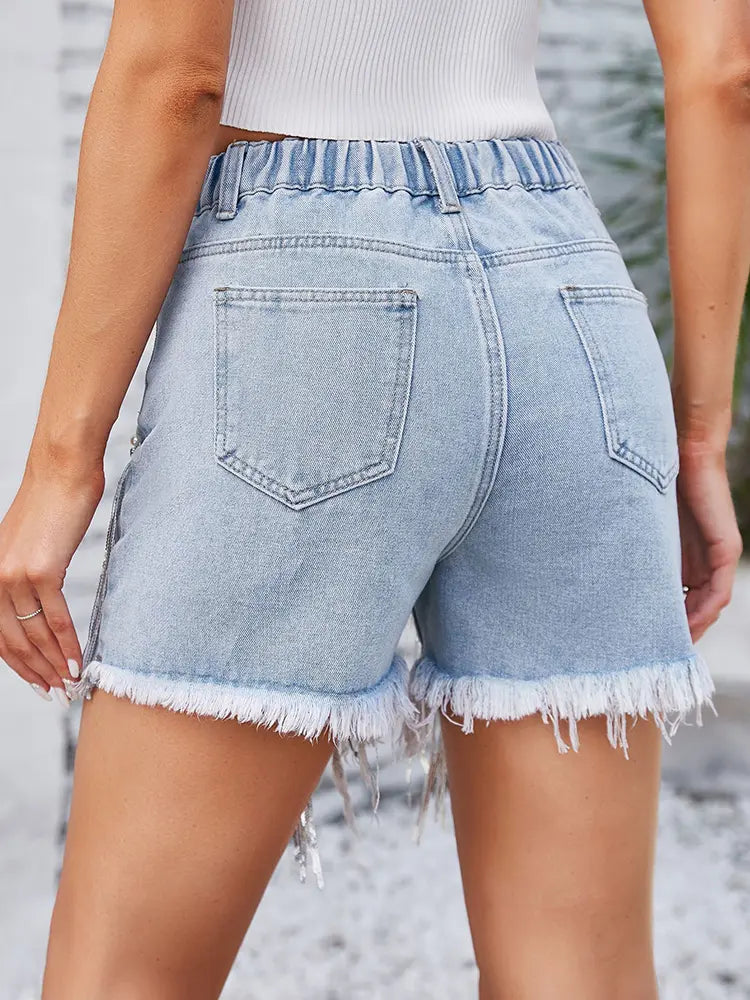Shorts con frange impreziosite scintillanti
