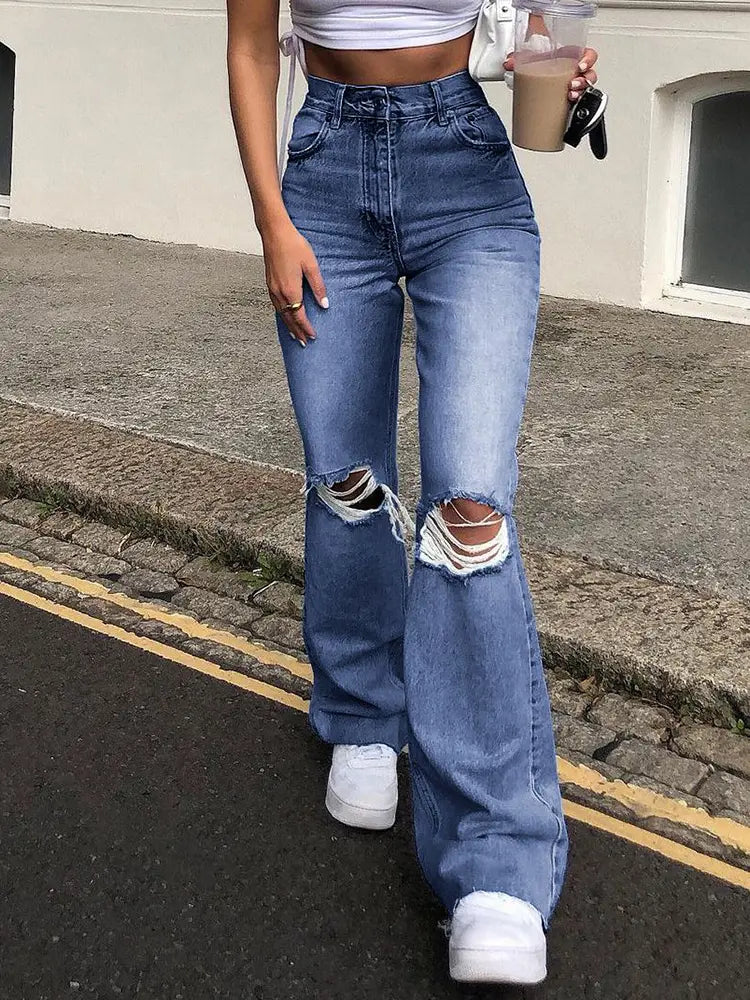 Jeans acampanados desgastados de pierna ancha