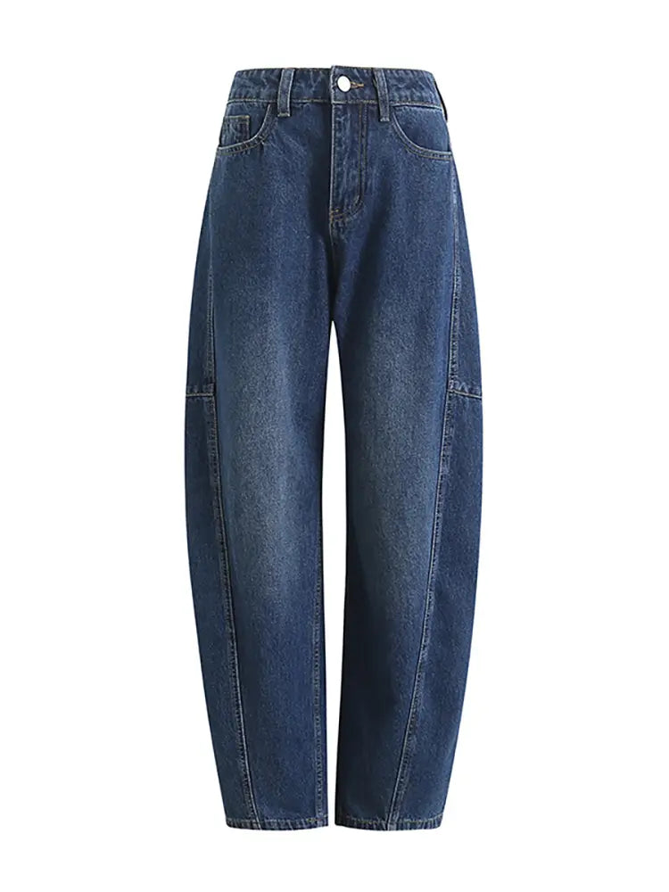 Pantalones de mezclilla sueltos con corte en arco a la moda