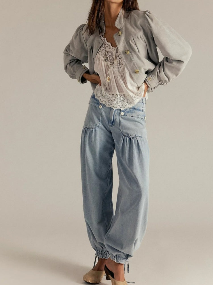 Jeans con orlo drappeggiato regolabile