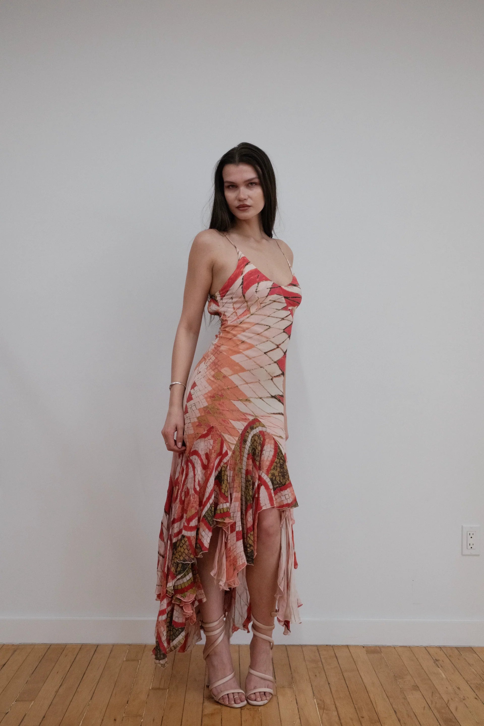 Maxi-jurk met mozaïekprint en asymmetrische snit