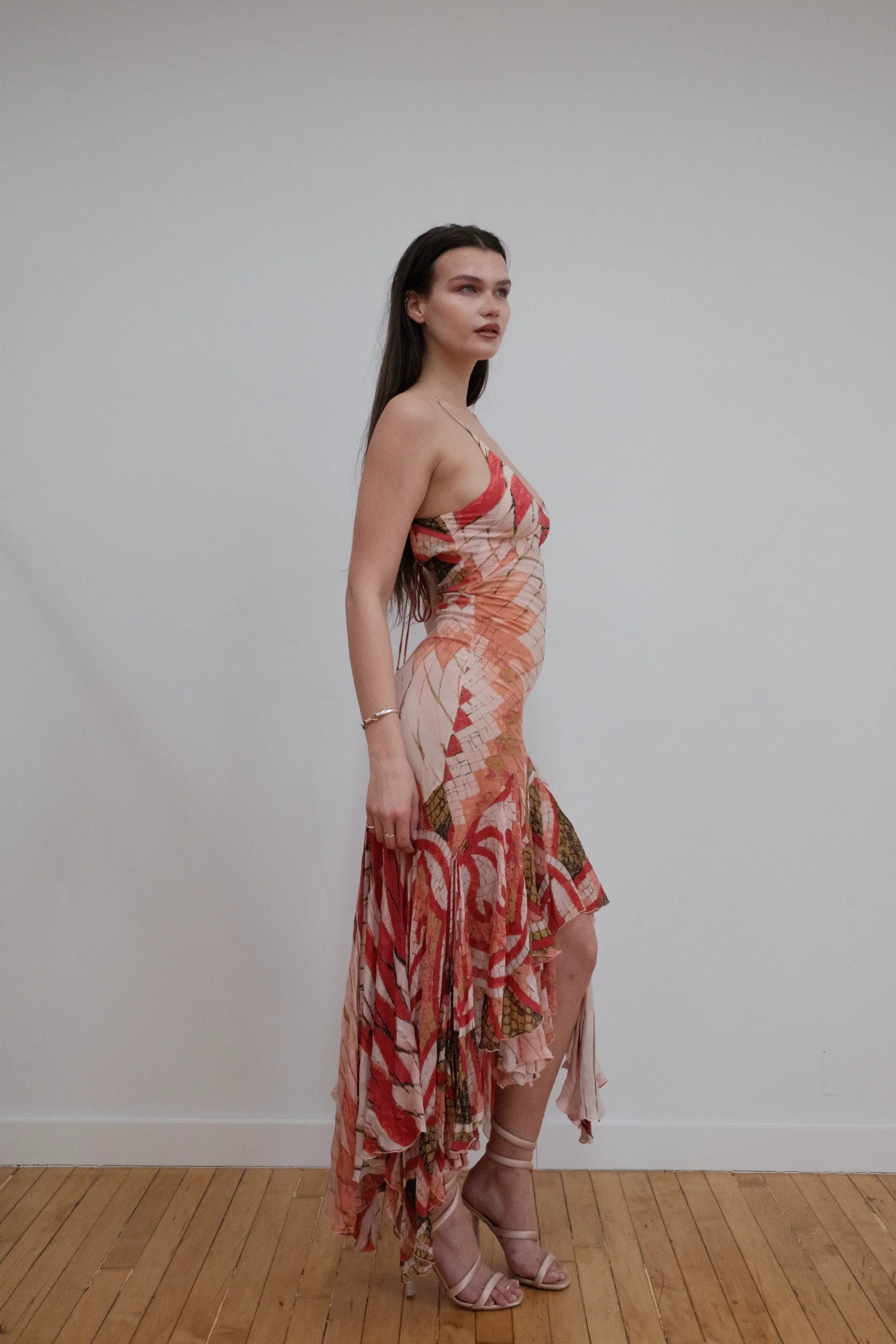 Maxi-jurk met mozaïekprint en asymmetrische snit