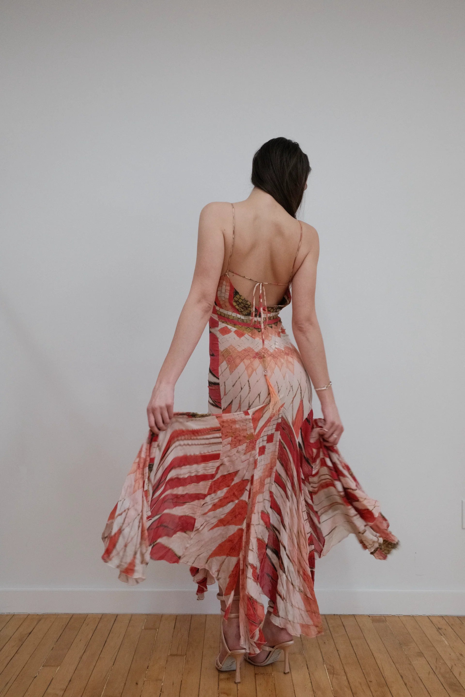 Maxi-jurk met mozaïekprint en asymmetrische snit