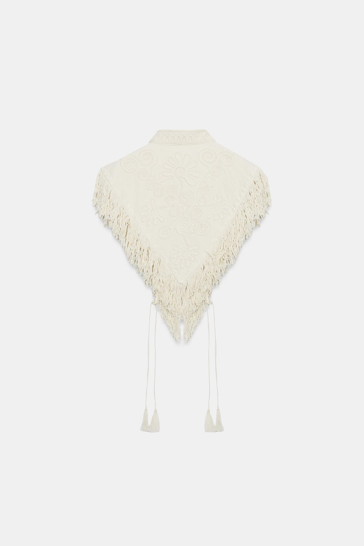 Gilet corto color crema ricamato con frange