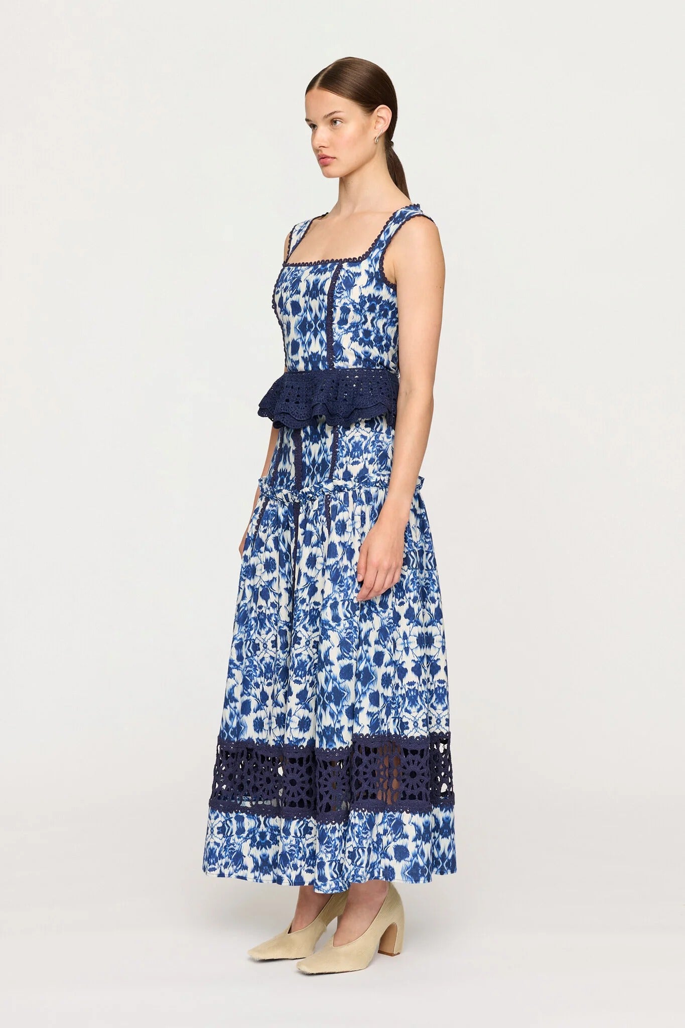 Blo Blummemuster Top mat Wellekante Peplum-Schnëtt